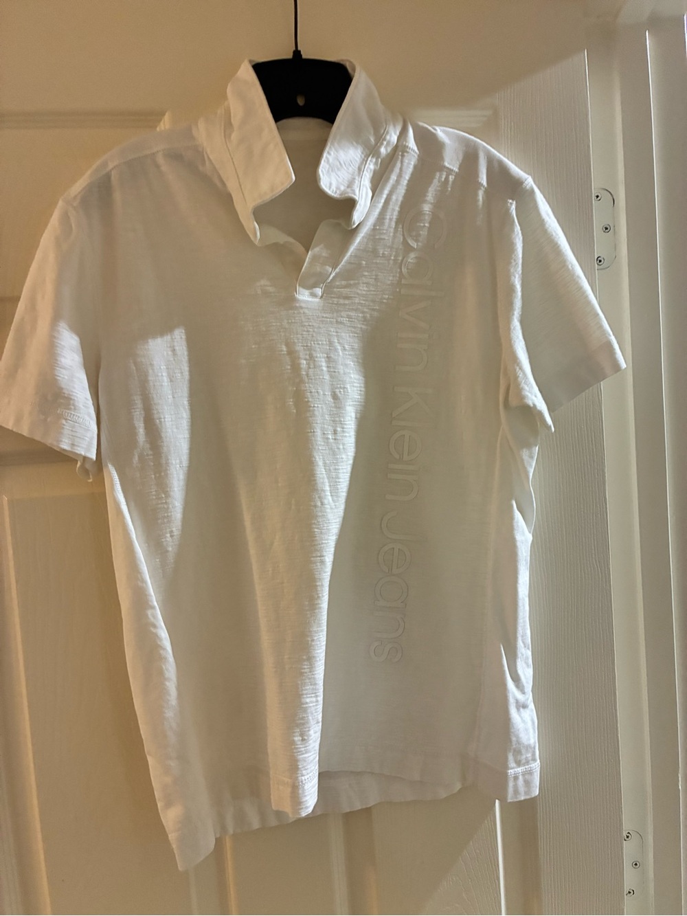 Calvin Klein Jeans Men's White Embossed-Logo Polo